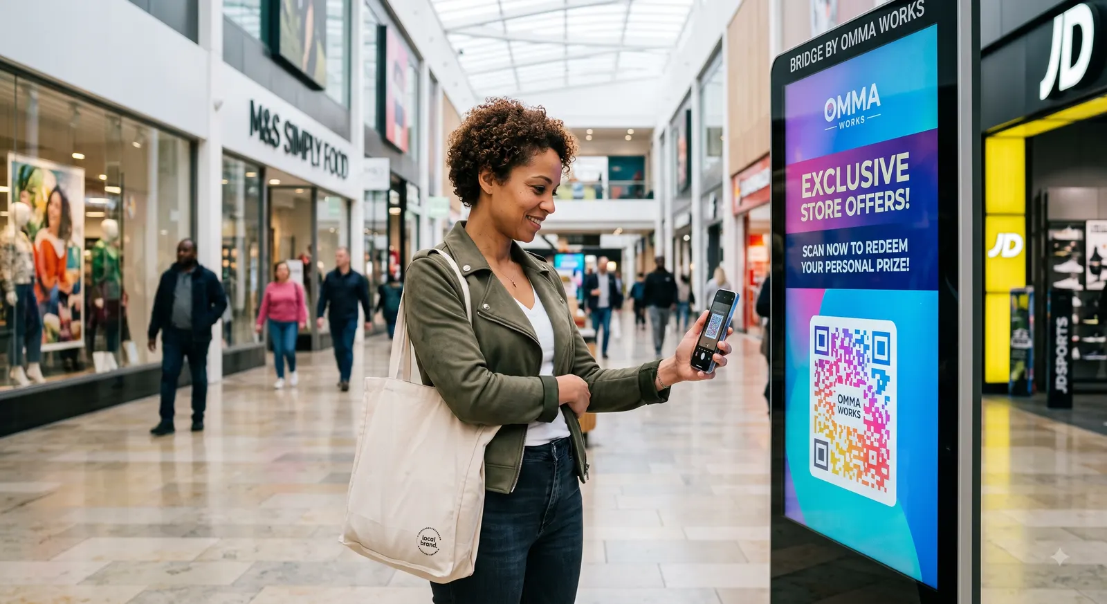 A shopper scanning a QR code on a mall screen to redeem a personal offer on her phone